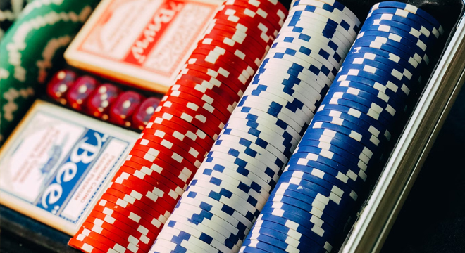 Photo of poker chips and poker cards.
